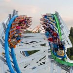 Roller Coaster with riders on two different tracks