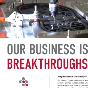 A close-up of a machine part being precisely drilled by automated equipment, highlighting innovation in package design. The words OUR BUSINESS IS BREAKTHROUGHS are boldly displayed below in gray and red text.